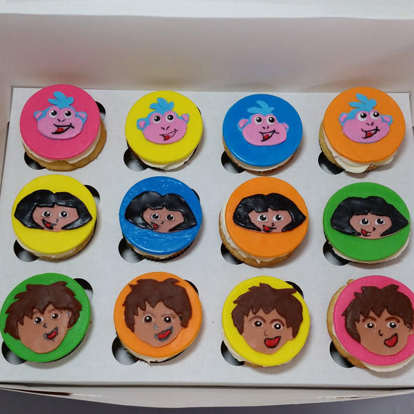 Dora Themed Vanilla Cupcakes with Flat Fondant Toppers $4.75/Cupcake. Minimum Order 1 Dozen